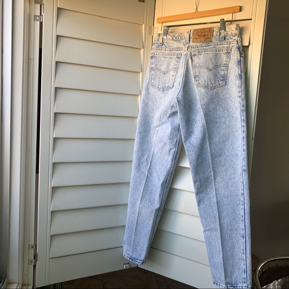 Vintage Levi’s 1989 orange tag acid wash jeans